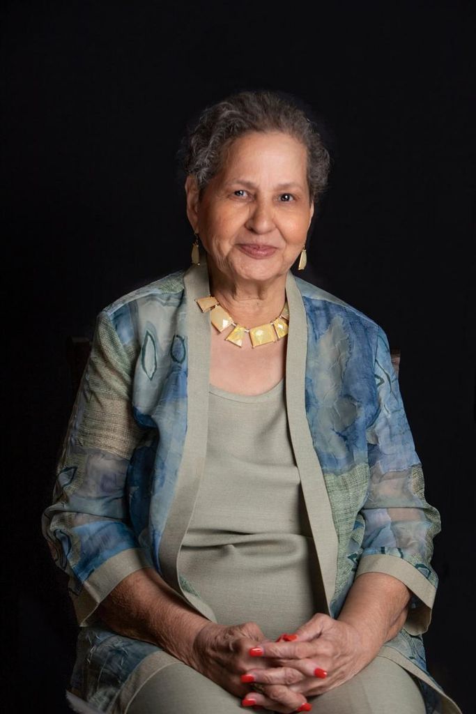 Example tribute photo — gentle candlelight (placeholder) for Doreen Dolores Timothy